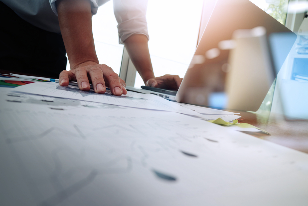 Double exposure of businessman hand working with new modern computer and business strategy as concept-Nov-25-2020-05-34-16-58-AM